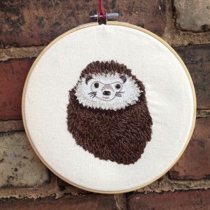 textile art, hedgehog, spots, brown, embroidery, wall hanging
